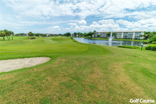3405 Bimini Ln Unit J4, Coconut Creek, FL 33066 - view of community with golf course view, a yard, and a water view