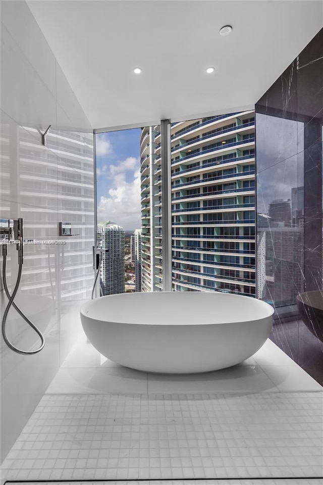 300 Biscayne Blvd Way Unit 4007, Miami, FL 33130 - bathroom featuring a freestanding tub, recessed lighting, and tile patterned floors