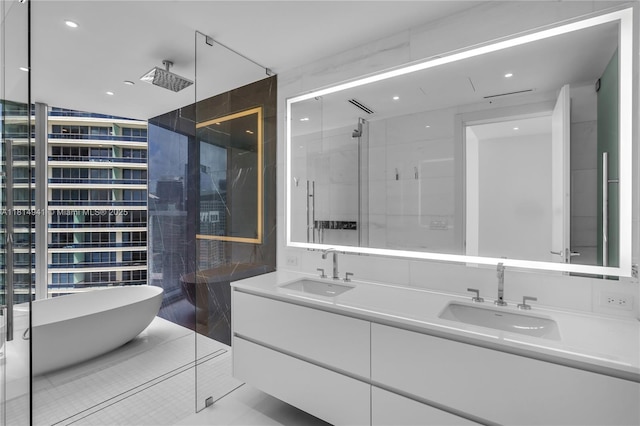 300 Biscayne Blvd Way Unit 4007, Miami, FL 33130 - bathroom with double vanity, a freestanding bath, a stall shower, and recessed lighting