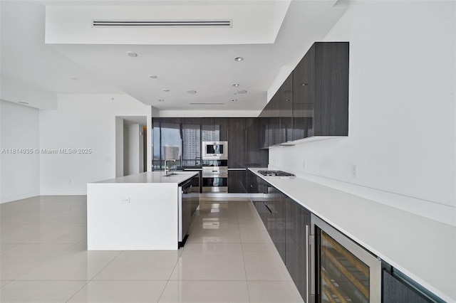 3250 NE 188th St Unit Lph07, Aventura, FL 33180 - kitchen with modern cabinets, stainless steel appliances, wine cooler, and light tile patterned flooring