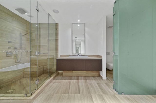 3250 NE 188th St Unit Lph07, Aventura, FL 33180 - bathroom featuring a shower stall, vanity, and toilet