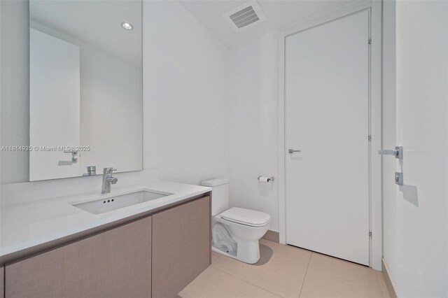 3250 NE 188th St Unit Lph07, Aventura, FL 33180 - bathroom featuring vanity, toilet, tile patterned flooring, and recessed lighting