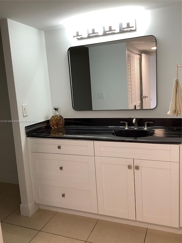 2333 Brickell Ave Unit 615, Miami, FL 33129 - bathroom with tile patterned flooring and vanity
