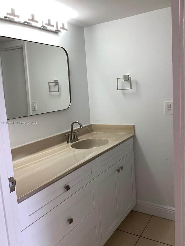 2333 Brickell Ave Unit 615, Miami, FL 33129 - bathroom featuring vanity, tile patterned flooring, and baseboards