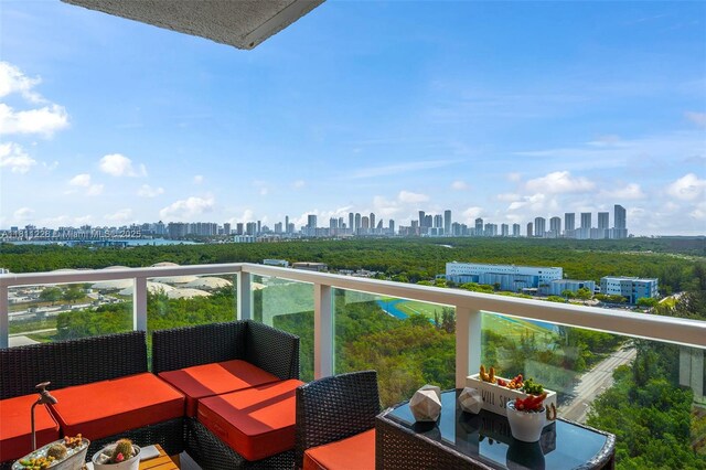 15051 Royal Oaks Ln Unit 2101, North Miami, FL 33181 - balcony with a skyline view and an outdoor living space