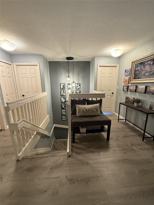238 Magnolia Ave, Davie, FL 33325 - dining room featuring baseboards, wood finished floors, and a textured ceiling