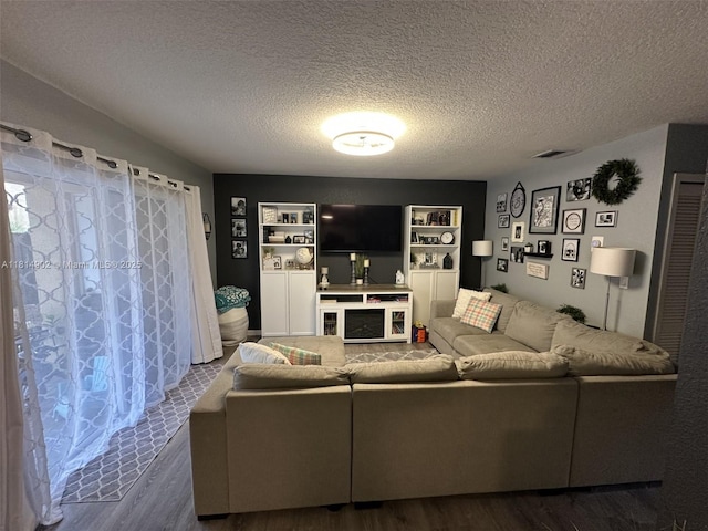 238 Magnolia Ave, Davie, FL 33325 - living room with wood finished floors and a textured ceiling