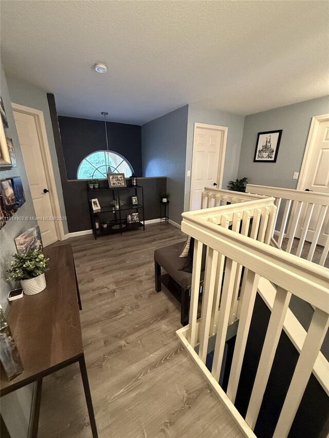 238 Magnolia Ave, Davie, FL 33325 - staircase with baseboards and wood finished floors