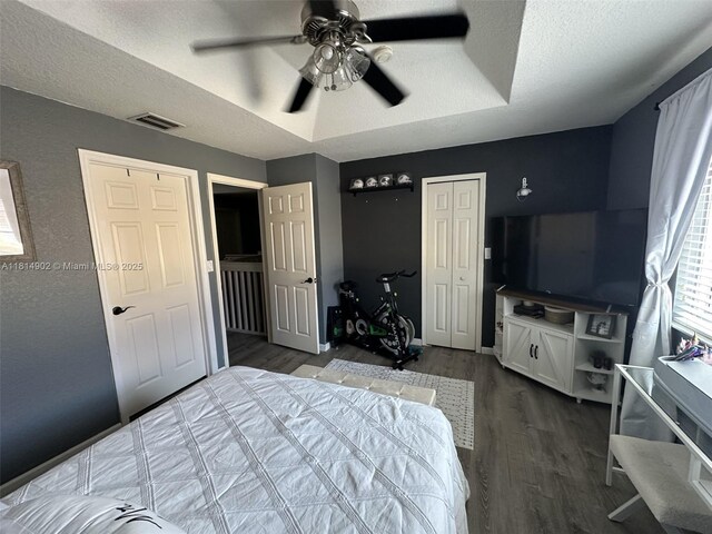 238 Magnolia Ave, Davie, FL 33325 - bedroom featuring wood finished floors, a textured ceiling, and ceiling fan