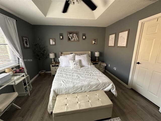 238 Magnolia Ave, Davie, FL 33325 - bedroom with dark wood-type flooring, baseboards, and a ceiling fan