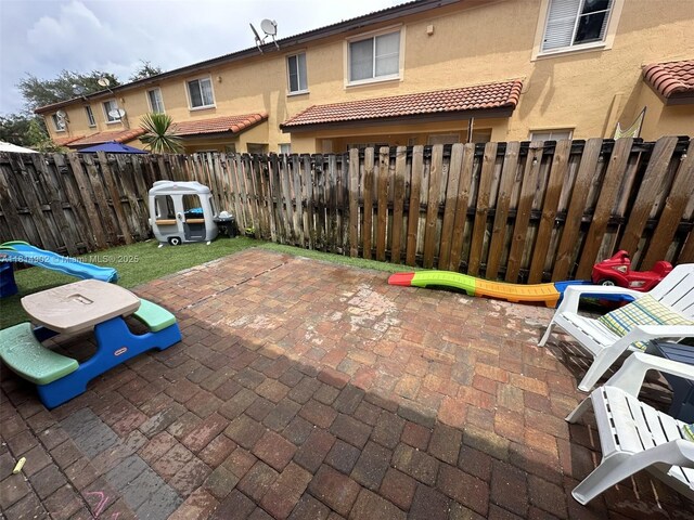 238 Magnolia Ave, Davie, FL 33325 - fenced backyard featuring a patio