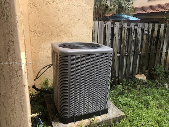 238 Magnolia Ave, Davie, FL 33325 - exterior view of central AC unit and stucco siding