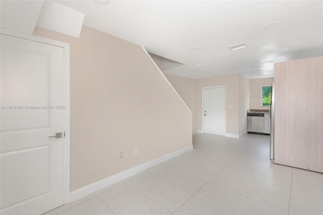 817 NW 3rd Ave, Fort Lauderdale, FL 33311 - unfurnished room with stairs and light tile patterned floors
