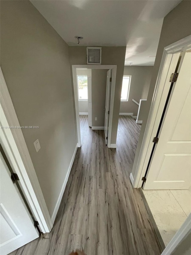 817 NW 3rd Ave, Fort Lauderdale, FL 33311 - hall featuring an upstairs landing and light wood-style floors