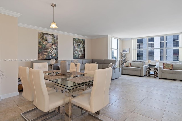 3015 N Ocean Blvd Unit 7D, Fort Lauderdale, FL 33308 - dining space with ornamental molding and light tile patterned flooring