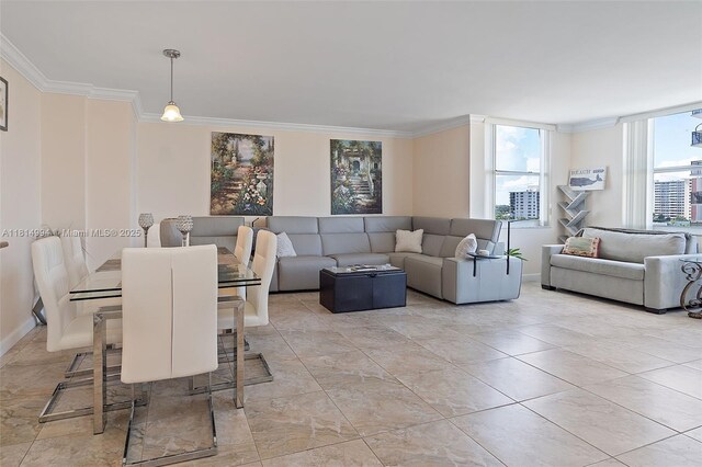 3015 N Ocean Blvd Unit 7D, Fort Lauderdale, FL 33308 - living area featuring crown molding and baseboards