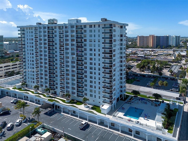 3015 N Ocean Blvd Unit 7D, Fort Lauderdale, FL 33308 - view of apartment building / complex with uncovered parking and a city view