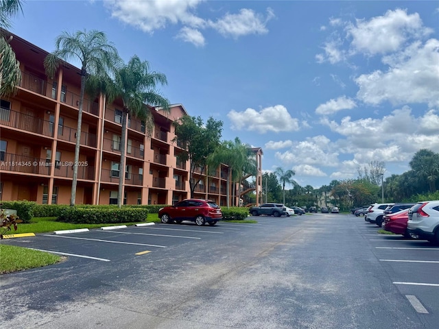 701 SW 142nd Ave Unit 414S, Pembroke Pines, FL 33027 - view of apartment building / complex with uncovered parking