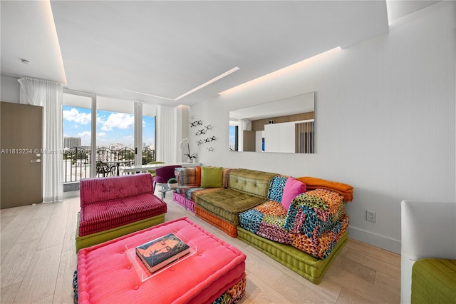 1500 Ocean Dr Unit 910, Miami Beach, FL 33139 - living room featuring hardwood / wood-style flooring and floor to ceiling windows