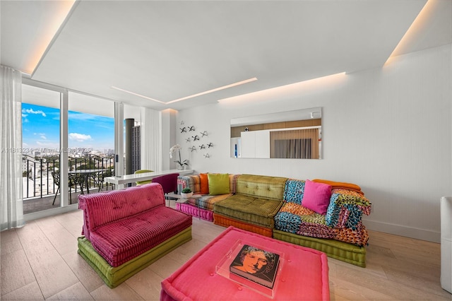 1500 Ocean Dr Unit 910, Miami Beach, FL 33139 - living room featuring hardwood / wood-style flooring and floor to ceiling windows