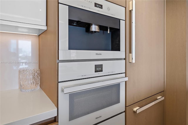 1500 Ocean Dr Unit 910, Miami Beach, FL 33139 - kitchen view of oven and light countertops