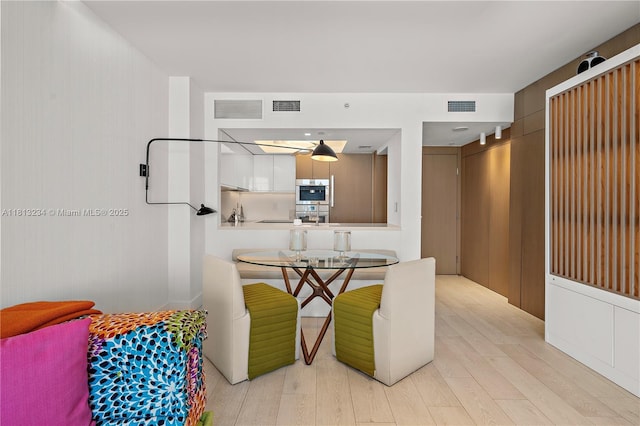 1500 Ocean Dr Unit 910, Miami Beach, FL 33139 - dining room with light wood-style floors
