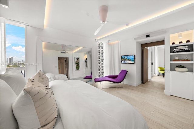 1500 Ocean Dr Unit 910, Miami Beach, FL 33139 - bedroom with light wood-style floors, access to outside, baseboards, and ceiling fan