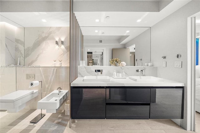 1500 Ocean Dr Unit 910, Miami Beach, FL 33139 - full bath featuring double vanity, a bidet, tile walls, and recessed lighting
