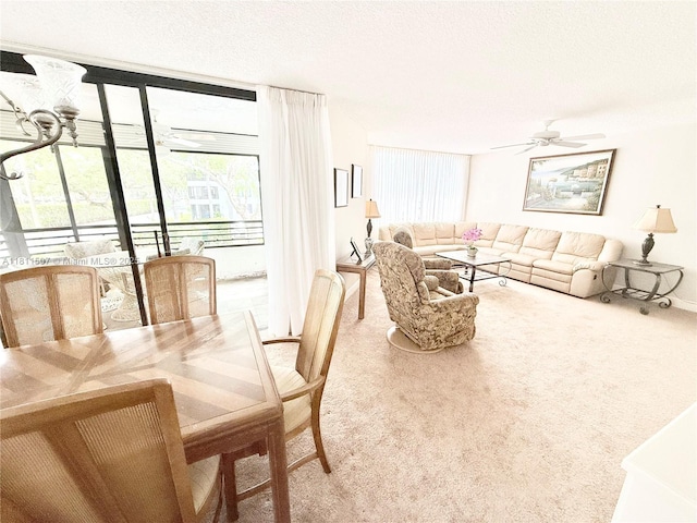 1470 Sheridan St Unit 18C, Hollywood, FL 33020 - carpeted dining area with a textured ceiling, expansive windows, and a ceiling fan