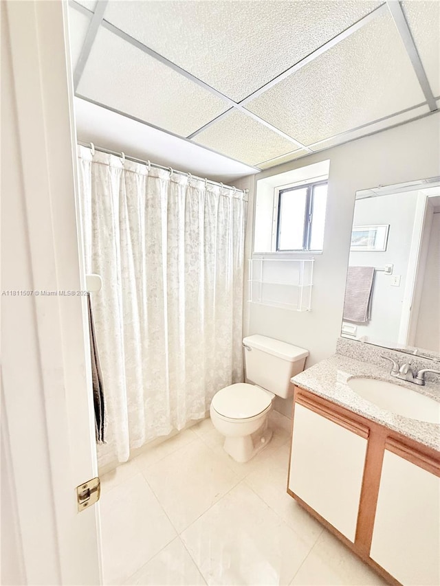 1470 Sheridan St Unit 18C, Hollywood, FL 33020 - bathroom with toilet, vanity, and tile patterned floors