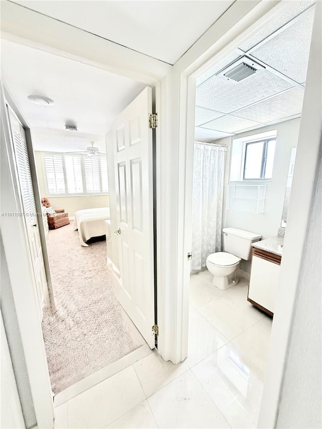 1470 Sheridan St Unit 18C, Hollywood, FL 33020 - full bathroom featuring toilet, vanity, ensuite bath, and ceiling fan