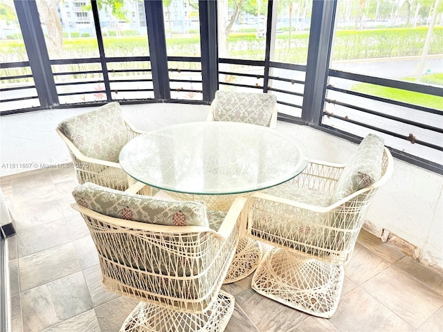 1470 Sheridan St Unit 18C, Hollywood, FL 33020 - sunroom featuring outdoor dining space and healthy amount of natural light
