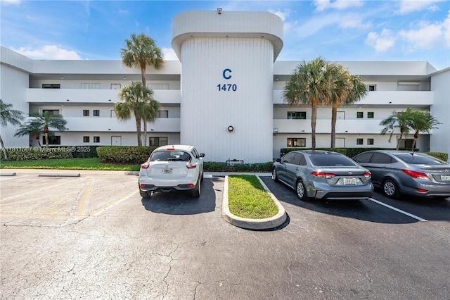 1470 Sheridan St Unit 18C, Hollywood, FL 33020 - view of building exterior with uncovered parking