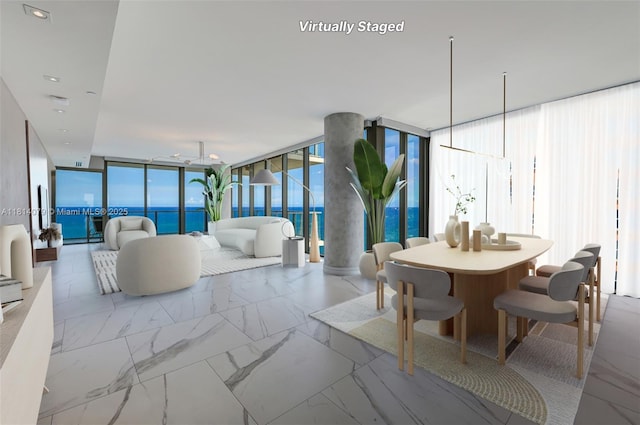 2200 N Ocean Blvd Unit S1801, Fort Lauderdale, FL 33305 - living room with expansive windows and marble finish flooring