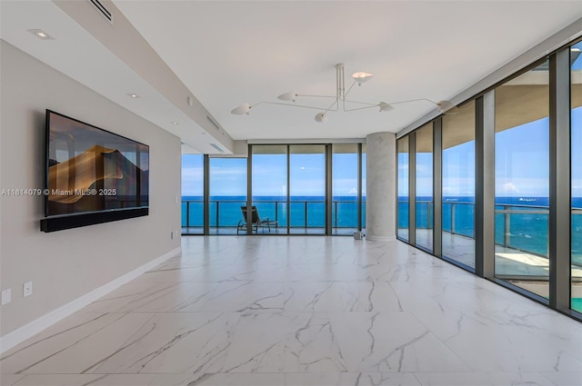 2200 N Ocean Blvd Unit S1801, Fort Lauderdale, FL 33305 - spare room featuring expansive windows, a water view, baseboards, and marble finish floors