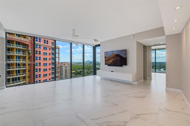 2200 N Ocean Blvd Unit S1801, Fort Lauderdale, FL 33305 - empty room with expansive windows, baseboards, marble finish flooring, and recessed lighting