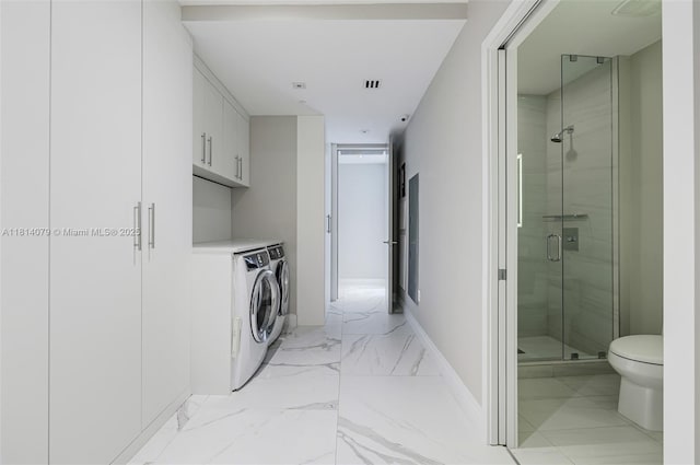 2200 N Ocean Blvd Unit S1801, Fort Lauderdale, FL 33305 - laundry room with independent washer and dryer, baseboards, and light marble finish flooring