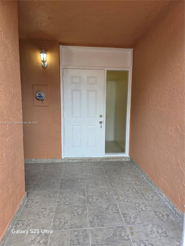 4102 W 10th Ln Unit 28, Hialeah, FL 33012 - property entrance featuring stucco siding