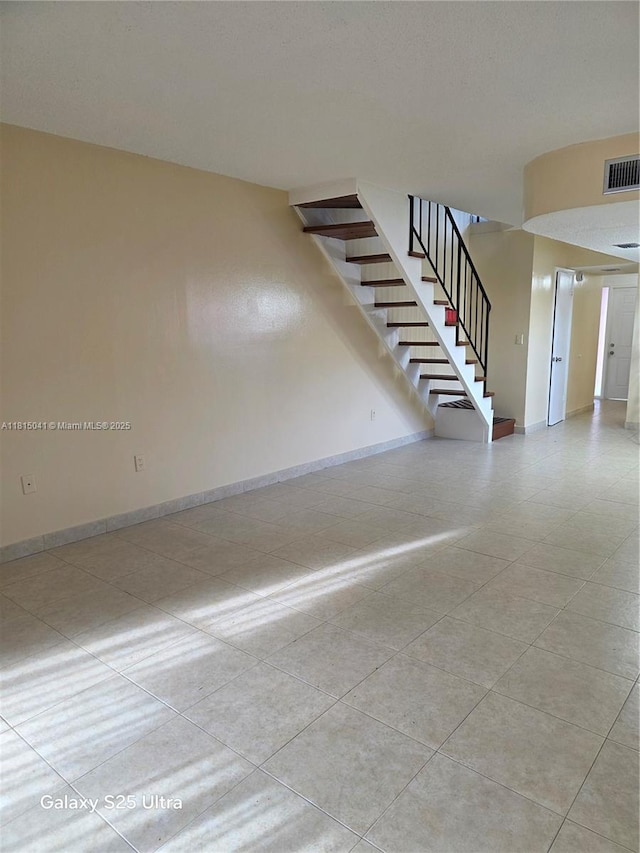 4102 W 10th Ln Unit 28, Hialeah, FL 33012 - stairway featuring baseboards