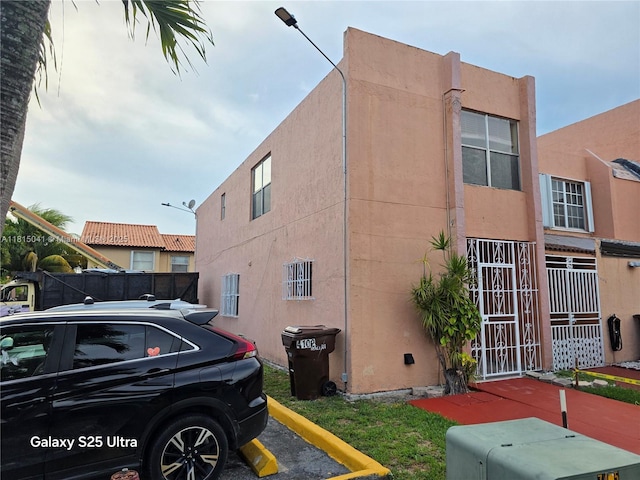 4102 W 10th Ln Unit 28, Hialeah, FL 33012 - view of property exterior featuring stucco siding
