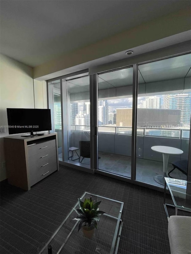 1395 Brickell Ave Unit 2814, Miami, FL 33131 - living room featuring dark carpet