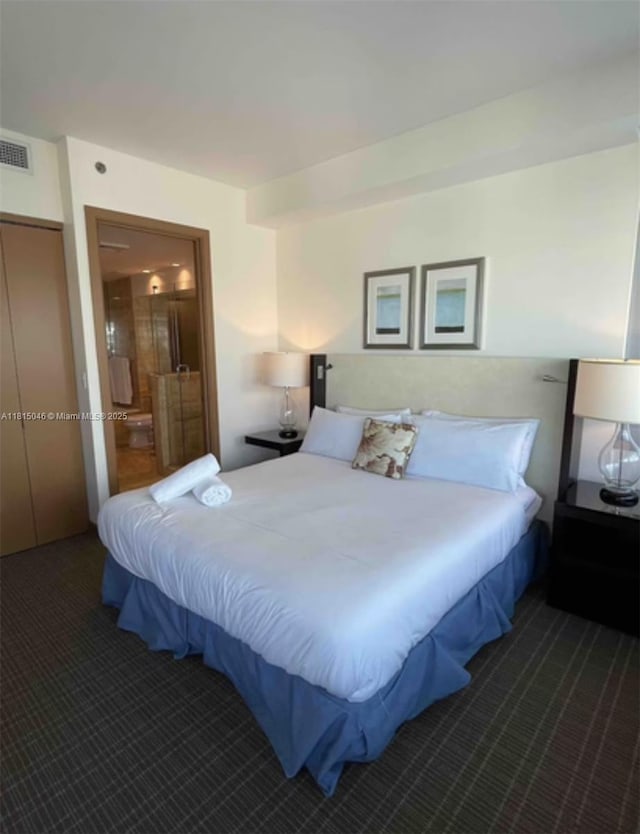 1395 Brickell Ave Unit 2814, Miami, FL 33131 - bedroom with carpet and ensuite bathroom