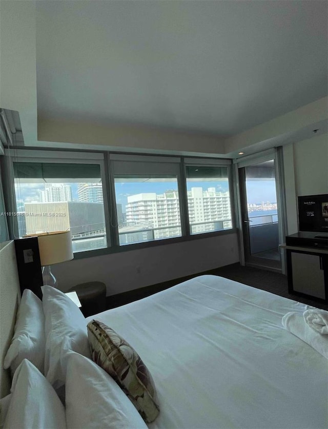 1395 Brickell Ave Unit 2814, Miami, FL 33131 - bedroom featuring multiple windows