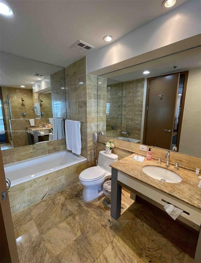 1395 Brickell Ave Unit 2814, Miami, FL 33131 - full bath featuring tiled bath, toilet, vanity, tiled shower, and recessed lighting