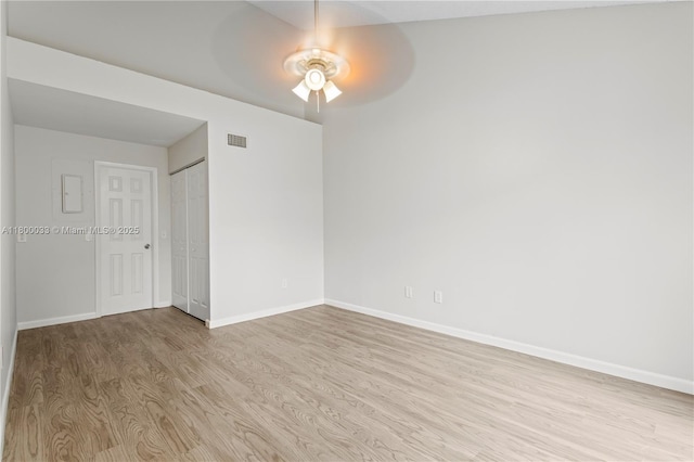 4159 Palm Bay Cir Unit A, West Palm Beach, FL 33406 - empty room featuring wood finished floors, ceiling fan, and baseboards