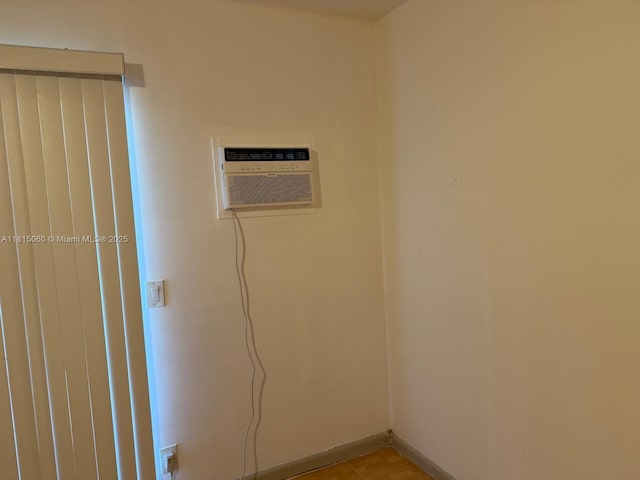 217 Suffolk F Unit 217, Boca Raton, FL 33434 - laundry room featuring an AC wall unit