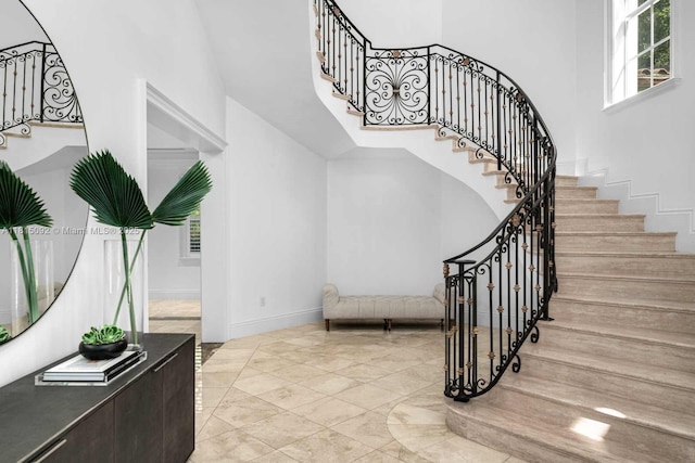 9500 SW 62nd Ct, Pinecrest, FL 33156 - staircase with a high ceiling and baseboards