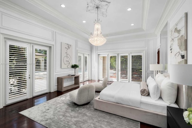 9500 SW 62nd Ct, Pinecrest, FL 33156 - bedroom featuring a chandelier, access to exterior, crown molding, a decorative wall, and dark wood-type flooring