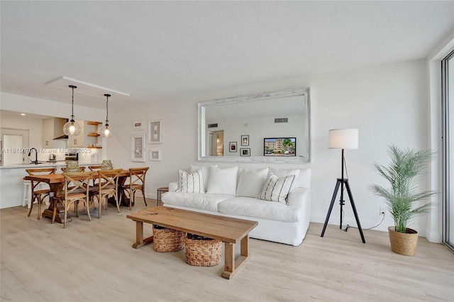 3150 N Course Ln Unit 405, Pompano Beach, FL 33069 - living area featuring light wood-style floors