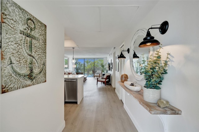 3150 N Course Ln Unit 405, Pompano Beach, FL 33069 - hallway featuring light wood-style flooring
